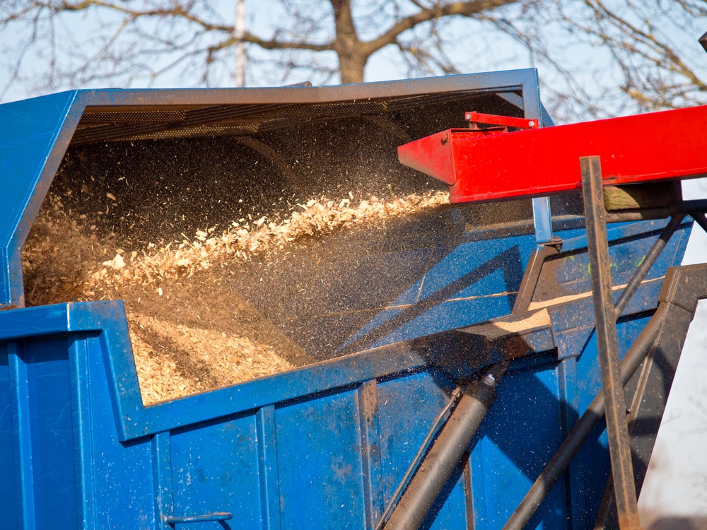 Wood chipper creating fine mulch in SC